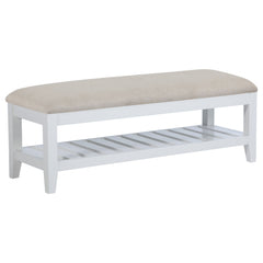 This sleek and versatile bench brings a touch of timeless elegance to any room. Its beige upholstered, foam-padded seat offers exceptional comfort while the sturdy wooden frame, finished in white, ensures long-lasting durability. A slatted shelf beneath t