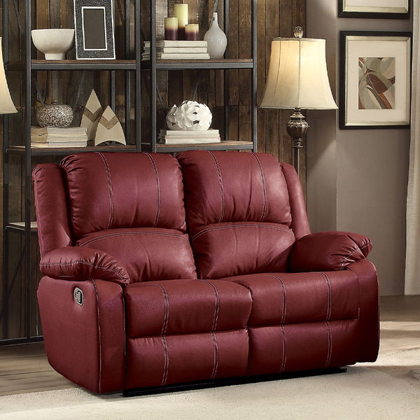 The Zuriel reclining sofa collection is a wonderful choice for any family room, combines luxurious faux leather with the comfort of padded, reclining seating. Comfortable contoured seats, soft to the touch while the reclining footrests offer full leg supp