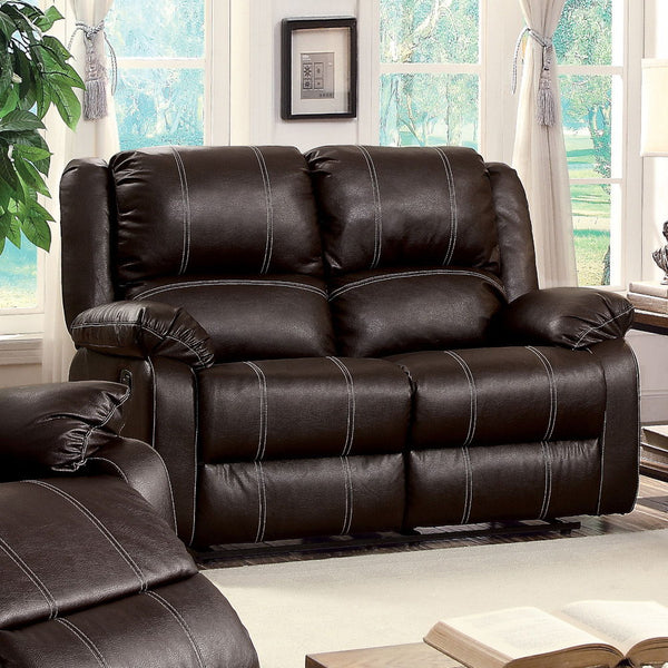 The Zuriel reclining sofa collection is a wonderful choice for any family room, combines luxurious faux leather with the comfort of padded, reclining seating. Comfortable contoured seats, soft to the touch while the reclining footrests offer full leg supp