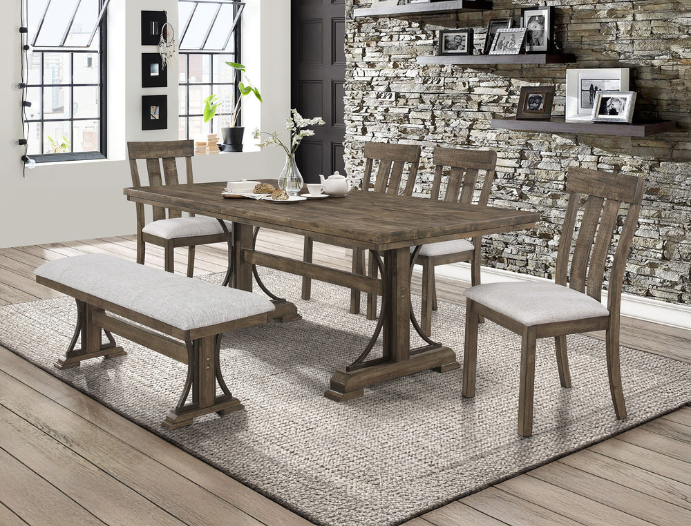 Experience rustic charm combined with urban sophistication in our latest dining ensemble. This collection boasts a robust wooden table with a distressed finish, capturing the essence of reclaimed beauty. The intricate trestle base showcases fine craftsman