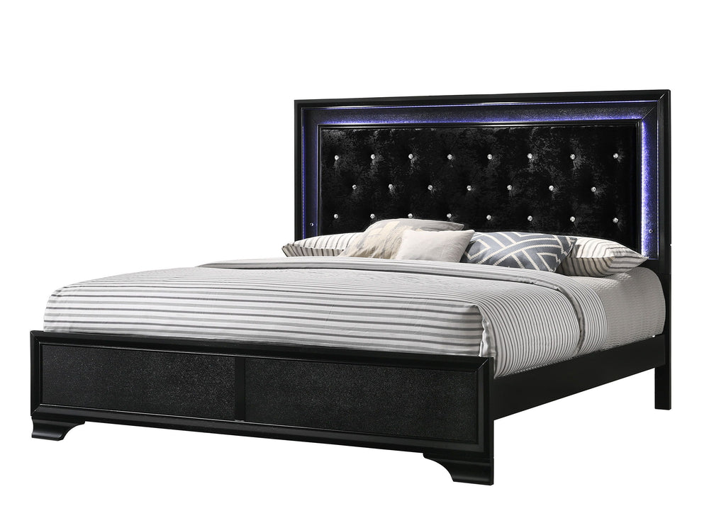 Step into a realm of sophistication and comfort with this stunning bedroom collection. Each piece showcases an exquisite blend of traditional charm and contemporary flair, making a bold statement with its textured surfaces and rich black finish. The bed, 