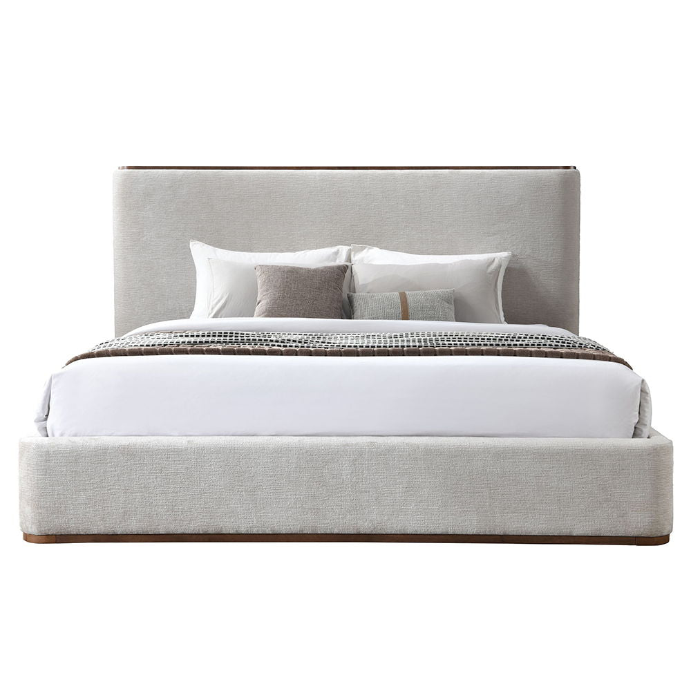 Adorned in elegant gray fabric, exudes contemporary charm with its full upholstered design and low profile footboard. Its soft, luxurious texture invites relaxation, while the minimalist aesthetic enhances any modern bedroom. The Orane collection is a per