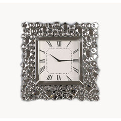 An even mix of function and fashion, this eye-catching Kachina wall clock keeps your eye on the hour with chic style. The faux gem inlay adorned frame with mirrored panels add a dash of glamour. Lean into this piece-'s traditional influence by adding it t
