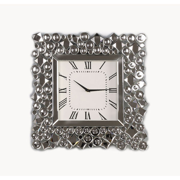 An even mix of function and fashion, this eye-catching Kachina wall clock keeps your eye on the hour with chic style. The faux gem inlay adorned frame with mirrored panels add a dash of glamour. Lean into this piece-'s traditional influence by adding it t