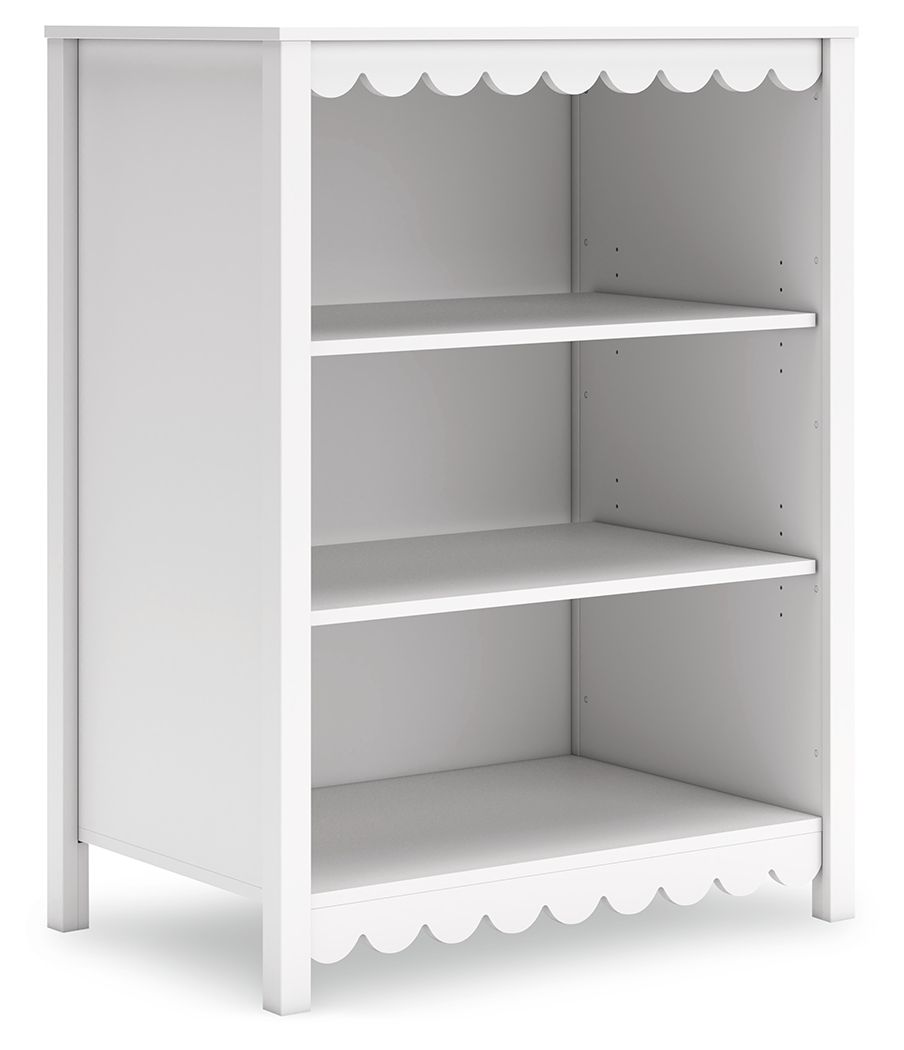 Thanks to its playful scalloped design, this bookcase is the perfect fit for cottage or coastal farmhouse interiors. The matte white finish serves as the perfect backdrop to showcase your personal taste and creativity. And its ample storage space lets you