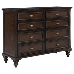 This eight-drawer dresser offers generous storage while maintaining an air of timeless sophistication. The dark oak finish accentuates the rich wood tones, while the gunmetal hardware adds a subtle, modern contrast. Each drawer features smooth metal exten