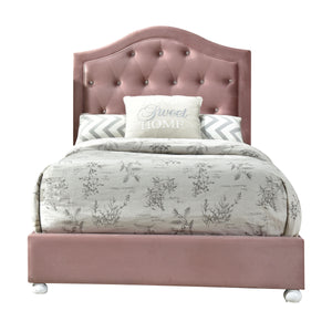 The Reggie youth bedroom set in pink fabric is full of character! Every piece in this glamorous collection features crystal-like button tuft details and cute wooden-bun legs in a crisp white finish. The panel bed features an arched headboard with a gentle