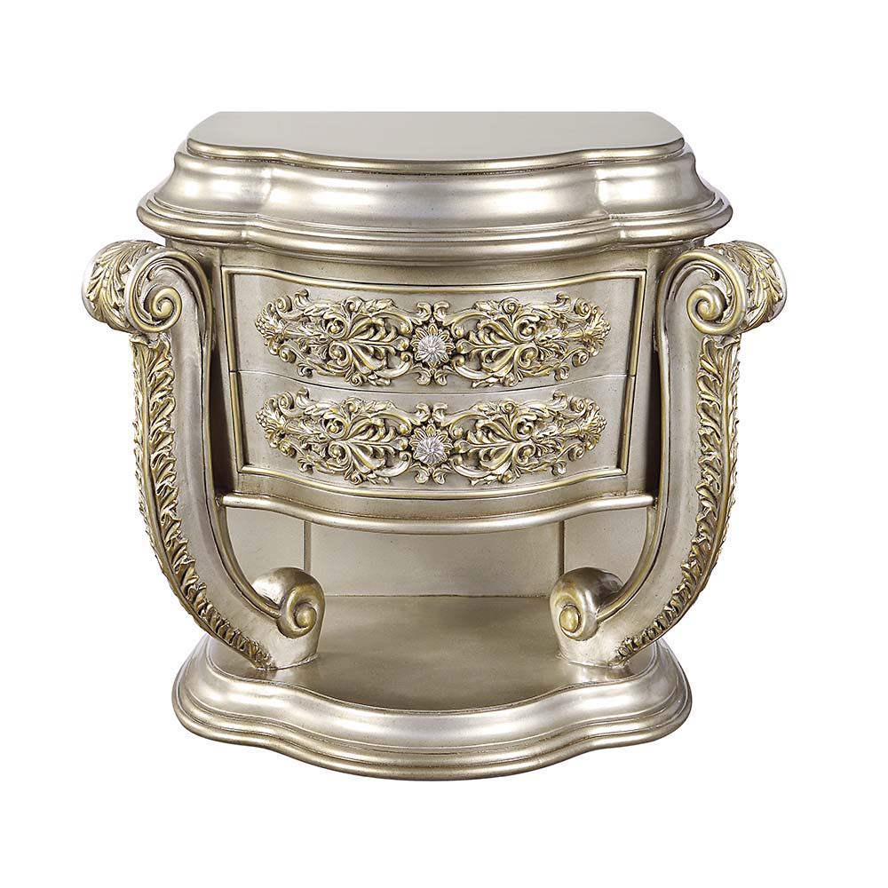 Feast your eyes upon the decadence and true luxury of the Danae collection of furniture! This striking bed defines opulence! Created to make a statement, this regal bed invites you to hold court in its divine carved curves and details. The Champagne finis