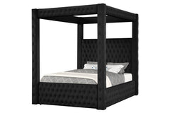 This majestic four-poster bed is a statement piece that exudes luxury and grandeur, perfect for creating a dramatic bedroom setting. It boasts a bold black finish that encapsulates modern opulence, while its sumptuous, tufted headboard and footboard are u
