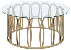 This round coffee table features a clear tempered glass top supported by a durable metal frame. The base is finished in a striking electroplated chocolate chrome, providing a deeper, rich brass tone. With its sleek design, this coffee table is an ideal ad