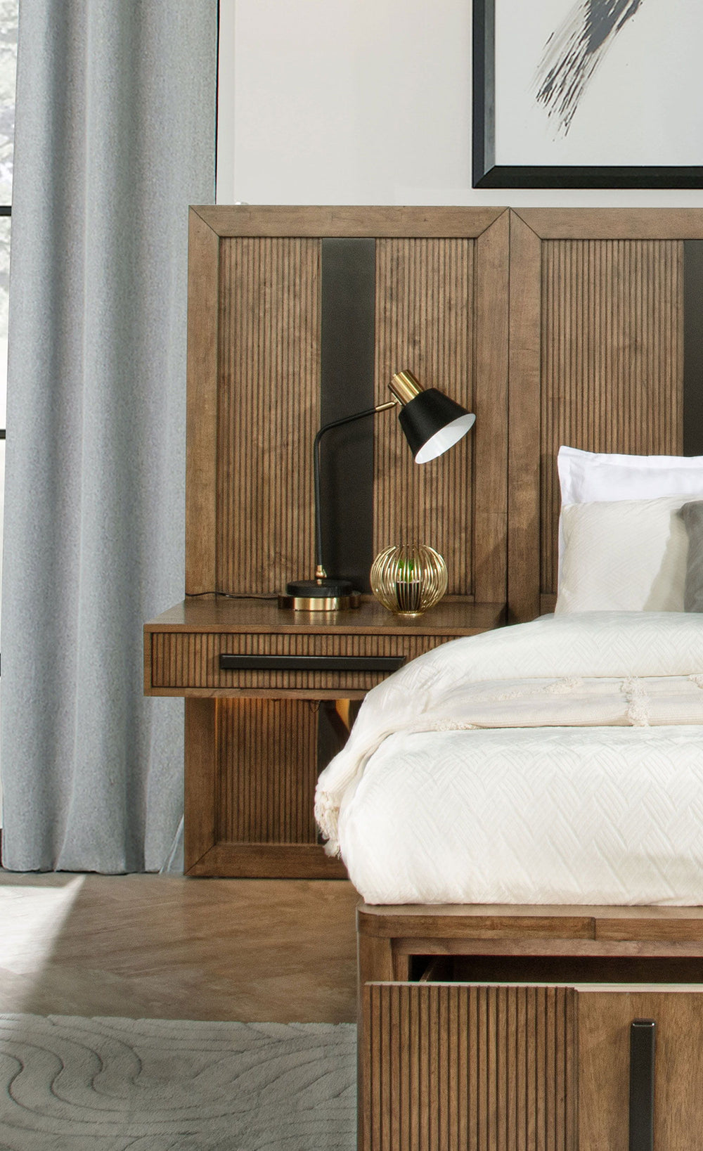 Expand your headboard with the wall panel design of a modern wooden nightstand. It blends seamlessly, perfectly complementing the matching headboard (not included) with vertical fluting and a dark center stripe. The wall panel is adorned with one slim dra
