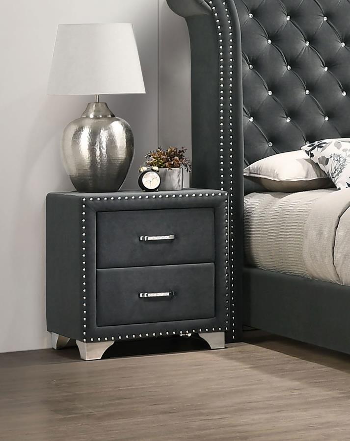 You-'ve never seen furniture so elegant until this nightstand entered the picture. Entirely upholstered in velvet, this nightstand is a conversation starter. It has two spacious drawers to store your bedside items. Nail head trim makes a glorious statemen