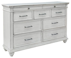 Give your retreat vintage charm and valuable drawer storage with this dresser. In a beautifully distressed whitewash finish, you-'ll love putting it all away in casual style. Seven full-sized drawers and two accessory top drawers will easily accommodate y