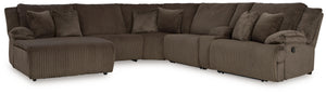 Experience unparalleled comfort with this reclining sectional with chaise. Itâ€™s a stylish and invitingly soft lookâ€”made all the more appealing by cozy corduroy cushions that feel great and add a touch of texture. The rich chocolate brown upholstery ef