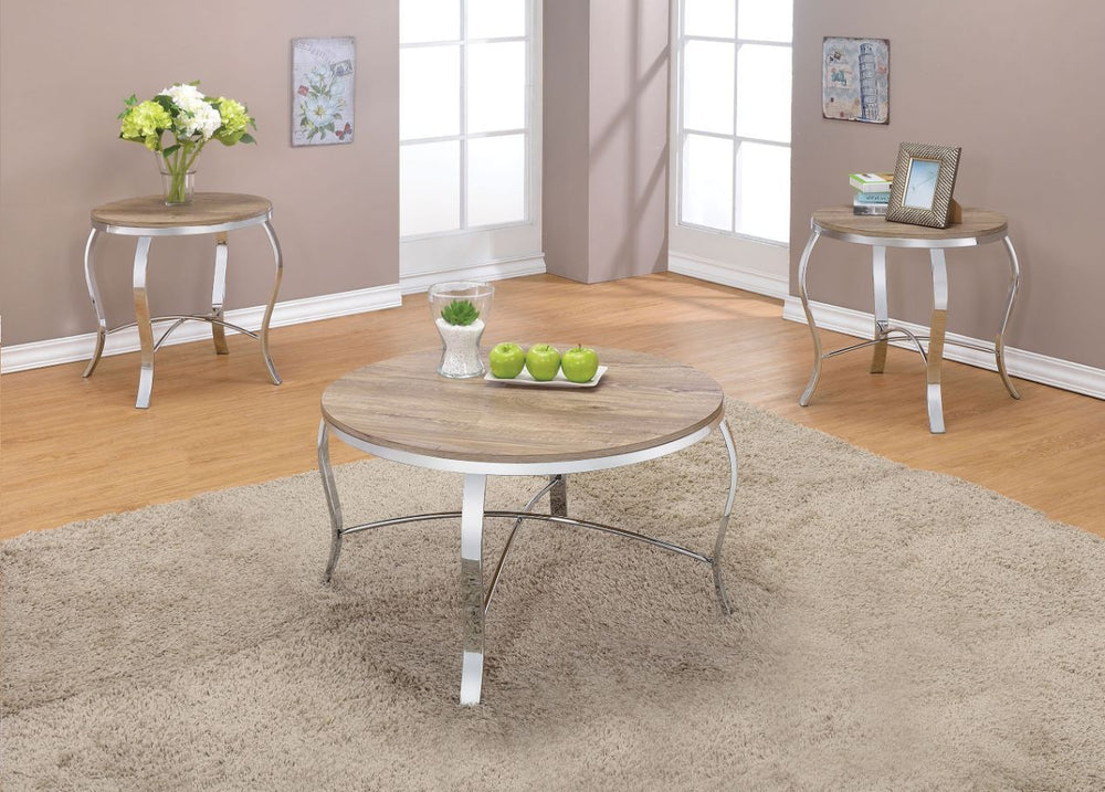 With its chrome finish base and weathered light oak top, this Malai coffee and end table set combines the contemporary and tradition to a transitional style. This table set is not just a functional table, but it is an architectural art piece with its curv