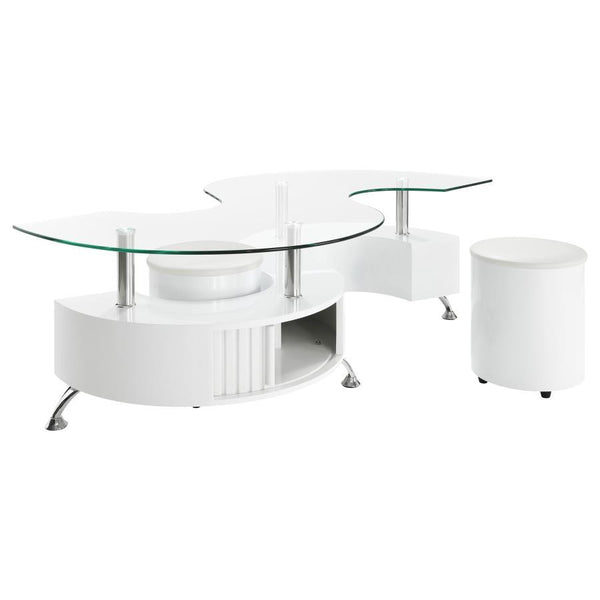 This coffee table features a serpentine shape with a clear tempered glass top and a durable engineered wood base. It includes two stools with padded seats, upholstered in faux leather for added comfort. A sliding door on both sides provides convenient sto