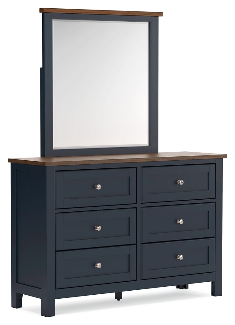 Add homespun charm to your restful retreat. A modern take on a timeless silhouette, this dresser and mirror set pairs a dark slate blue finish with a light brown top. Drawer fronts and legs in a classic Shaker style bring an air of beautiful simplicity to