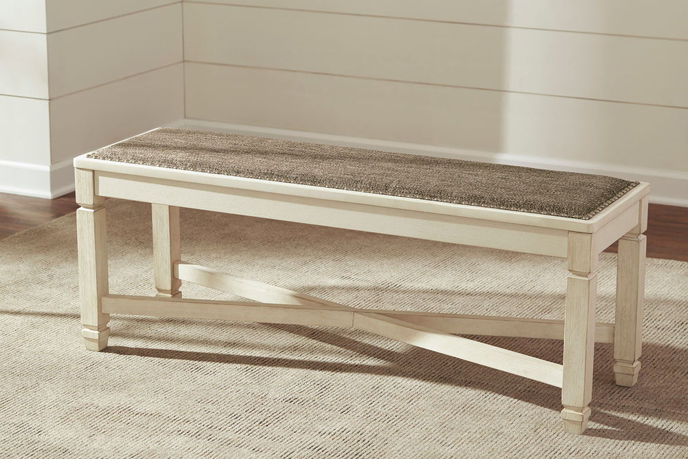 Unique two-tone finish with a combination of Oak and Acacia substrates combining a trendy textured antique white color with table and server tops finished in a textural weathered oak finish. Rectangular dining table features six convenient drawers for sto
