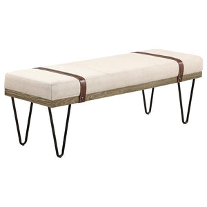 Dress up a living room with the interesting details from this modern rustic bench. Featuring open hairpin legs in a black finish, this bench marries a variety of design elements to make a statement. Classic colors, such as beige, add texture to the straig