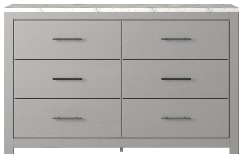 Cool, clean and casually modern. This dresserâ€™s wispy dove gray finish and faux Calcutta marble top set the tone for your calming sanctuary. Large linear pulls add dimension and authenticity. Six smooth-gliding drawers neatly accommodate your wardrobe n