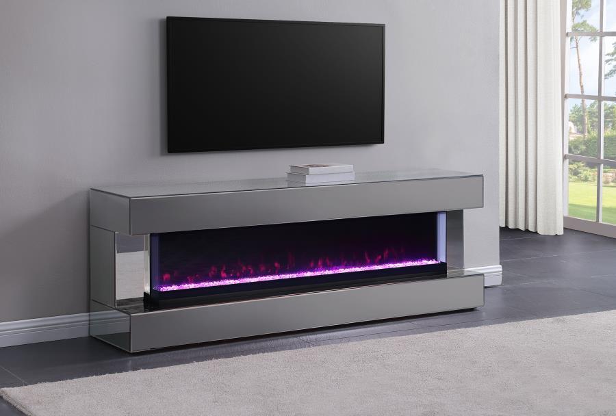 Create incredible ambiance in your living room with a modern TV stand that includes a visual flame box. It delivers realistic three-dimensional flames that offer 13 color options and adjustable brightness to create the perfect mood. The case features clea