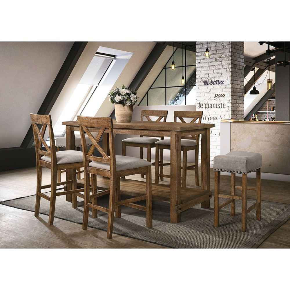 The Martha II Counter Height Table will anchor any dining area in effortless style. This rectangular wood table features a sturdy wood top, lower display, storage shelf and is perfect for weekday meals and family gatherings alike. The versatile table is d