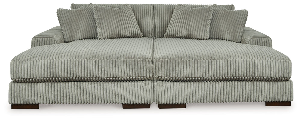 Plush and posh. Showcase your eye for on-trend texture with the statement-making cord upholstery of this double-chaise sectional. Its stunningly soft fabric entices in a warm neutral hue, complementing contemporary color palettes. Sink into the cushions a