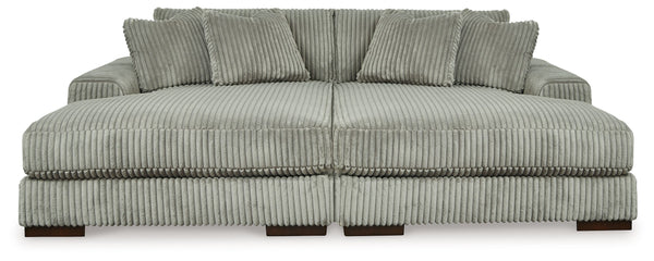 Plush and posh. Showcase your eye for on-trend texture with the statement-making cord upholstery of this double-chaise sectional. Its stunningly soft fabric entices in a warm neutral hue, complementing contemporary color palettes. Sink into the cushions a