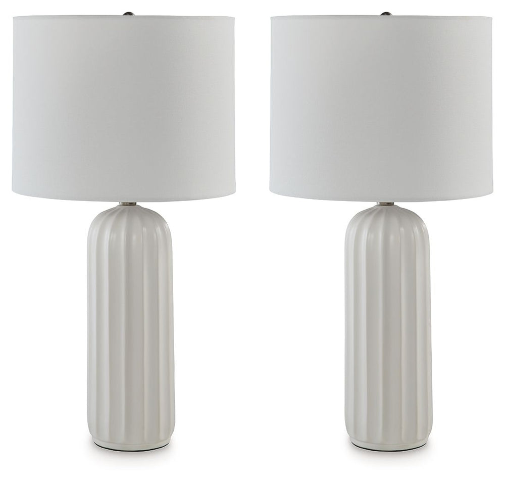 Set the scene for bedtime reads and living room lounging with this table lamp. Simple and unassuming, the all-white look keeps contemporary style top of mind without overwhelming your decor with detail. Itâ€™s chic, crisp and completes your daily routines