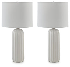 Set the scene for bedtime reads and living room lounging with this table lamp. Simple and unassuming, the all-white look keeps contemporary style top of mind without overwhelming your decor with detail. Itâ€™s chic, crisp and completes your daily routines