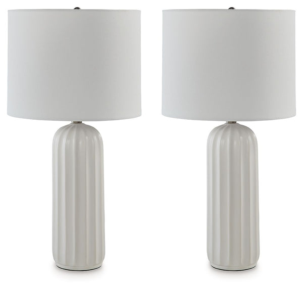 Set the scene for bedtime reads and living room lounging with this table lamp. Simple and unassuming, the all-white look keeps contemporary style top of mind without overwhelming your decor with detail. Itâ€™s chic, crisp and completes your daily routines