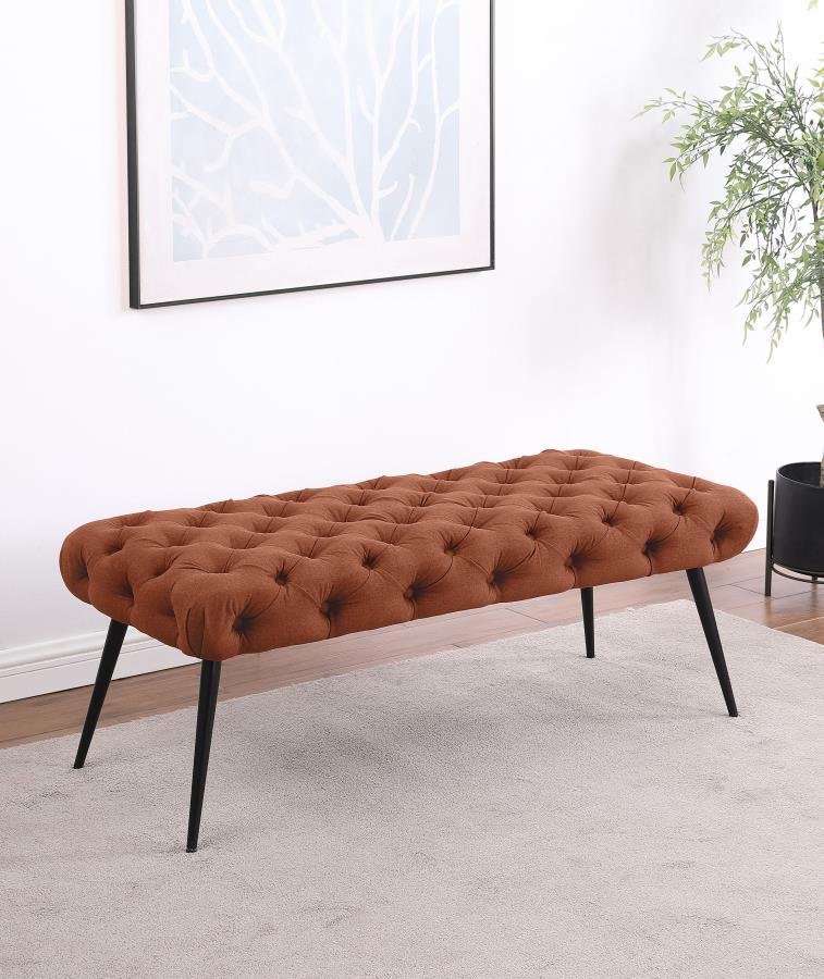 Enhance your living area, bedroom, or entryway with this sophisticated bench, skillfully blending timeless tufting and plush upholstery for a luxurious look and feel. Its meticulous button-tufted top adds depth and dimension, while slender metal legs prov