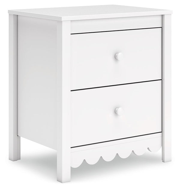 Thanks to its playful scalloped design, this nightstand is the perfect fit for cottage or coastal farmhouse interiors. The matte white finish serves as the perfect backdrop to showcase your personal taste and creativity. And its spacious drawers let you s