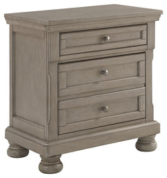 Satisfying your taste for tradition, this nightstand sports serene sophistication. Forever classic design detailsâ€”inlaid panels, silvertone patina hardware and bun feetâ€”are so easy to love. Its burnished light gray finish elevates the look with modern