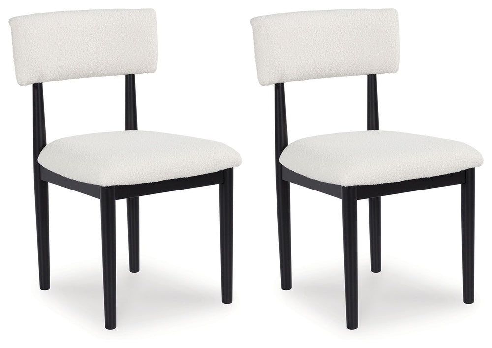 Clean lines meet cool curves with this dining chair. Simple round post legs and a black finish lend a modern vibe, while softly textured upholstery tempts you to sit and stay awhile. What a delicious choice for a dining room update.<br><br><b>Additional D
