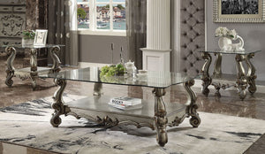 KD, Rectangular Coffee Table w/Glass Top â€¢ Open Compartment: Bottom Shelf â€¢ 10mm Clear Tempered Glass w/Beveled â€¢ Oversized Scrolled Legs & Shelf Apron: Poly Resin with Antique Contrast Finish<br/><br/><b>Product Features</b><ul><li>Exclusive Design