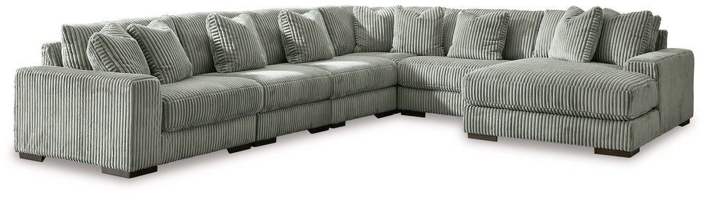 Plush and posh. Showcase your eye for on-trend texture with the statement-making cord upholstery of this sectional with chaise. Its stunningly soft fabric entices in a warm neutral hue, complementing contemporary color palettes. Sink into the cushions and