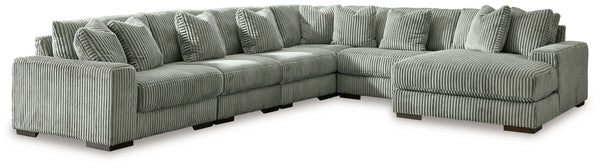 Plush and posh. Showcase your eye for on-trend texture with the statement-making cord upholstery of this sectional with chaise. Its stunningly soft fabric entices in a warm neutral hue, complementing contemporary color palettes. Sink into the cushions and