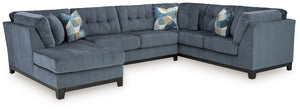 Fresh, on-trend style meets functionality in this sectional with chaise. Details like tufted cushions and a wrap-around accent base reflect your urban contemporary tastes while staying versatile as your style changes. And with its soft upholstery, your co