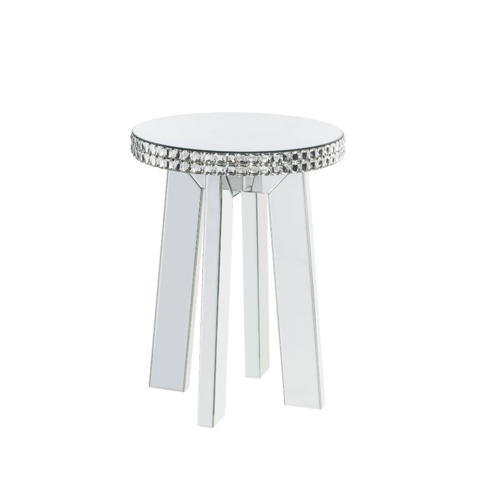 This mirrored and faux crystals Lotus occasional table is an alluring focal piece. Masterfully crafted with a wooden frame and beveled mirrored finish for durable construction. The mirrored splayed legs help give your space an open feeling. The faux cryst