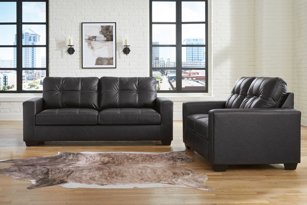 Everyday comfort meets versatile style in this matching sofa and loveseat set. The handsome hue of the goes-with-anything faux leather takes away the stress of styling, expertly pairing with your existing aesthetic. From kicking back on the weekends to re