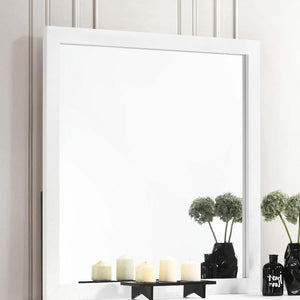  this mirror rests on top of a dresser and offers height to focal walls. The flush and smooth frame presents a simple minimalist surface