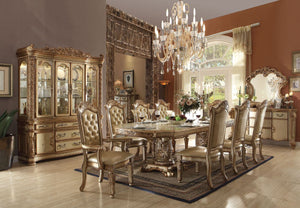 Create a dining room that will impress your dinner guests for years to come. With the Vendome collection, each piece of this collection demonstrates delicate craftsmanship and intricate carved details such as scrolls, bone upholstery, and nailhead. The ta