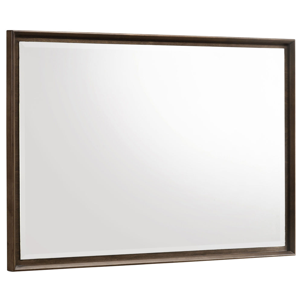 Augment your stylish dresser with a modern framed mirror. Perfect for the dresser top, it mounts directly and features a warm brown wood finish. The mirror boasts beveled glass for added depth, complementing its stylish reflectivity and depth. Mitered tri