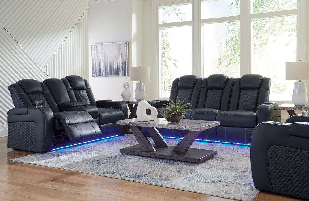 This power reclining set goes beyond basic comfort. It upgrades the everyday, turning your living room into an entertainment hub. Donâ€™t want to leave your seat? Keep essentials in reach with assorted charging options, cup holders and storage arms. You c