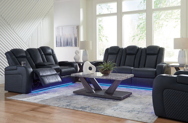 This power reclining set goes beyond basic comfort. It upgrades the everyday, turning your living room into an entertainment hub. Donâ€™t want to leave your seat? Keep essentials in reach with assorted charging options, cup holders and storage arms. You c