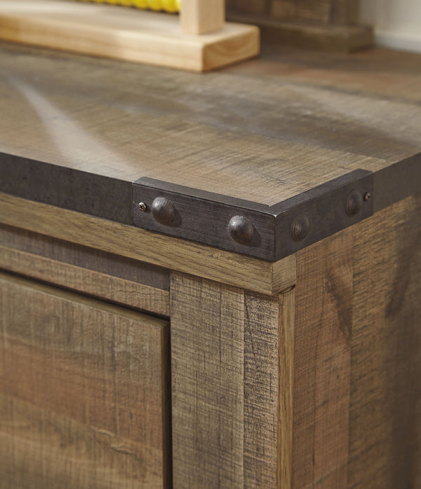  plank-style details and nailhead trim pay homage to reclaimed barn wood