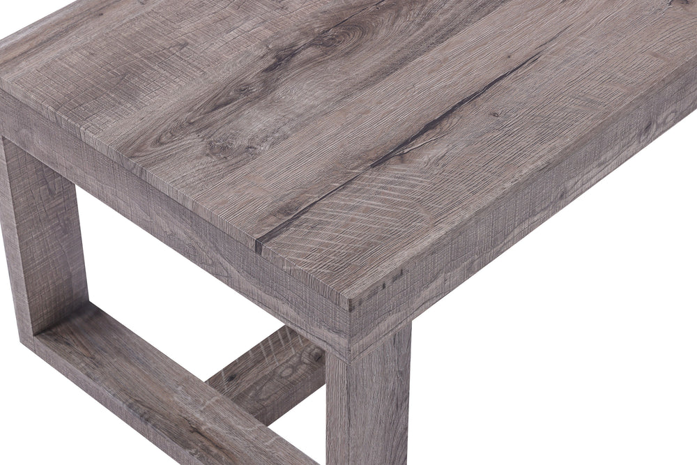 Infuse your living room with a touch of rustic elegance with this distinctive cocktail table set. Crafted with a weathered wood finish, the robust, clean-lined design exudes simplicity and strength, creating a harmonious blend of rustic charm and contempo