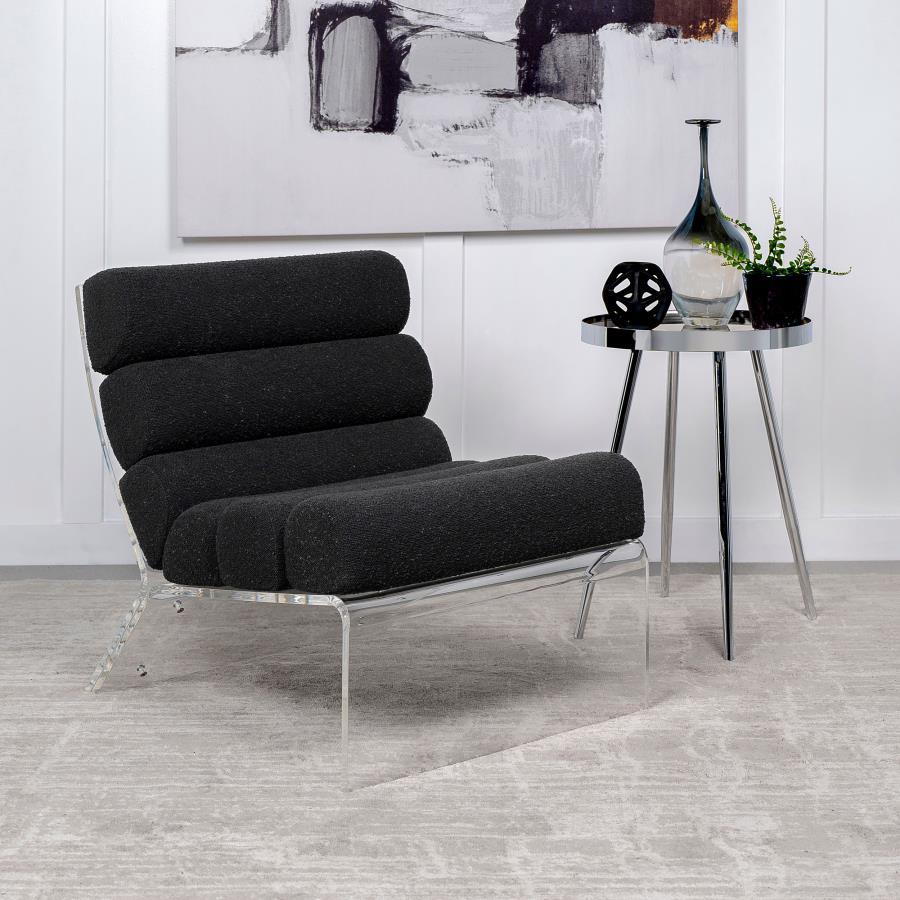 Discover a fusion of contemporary design and luxurious comfort in this accent lounge chair, where horizontal channeling meets the rich texture of bouclÃ© fabric. The thick, clear acrylic frame, crafted with the highest quality, surrounds the upholstered e