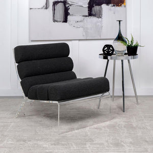  where horizontal channeling meets the rich texture of bouclÃ© fabric. The thick